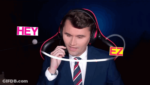 Man In Suit Wearing Headphones Saying Hey Don't Say That GIF