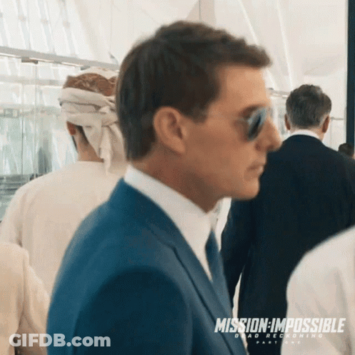 Man In Suit Wearing Sunglasses Mission Impossible Ad GIF