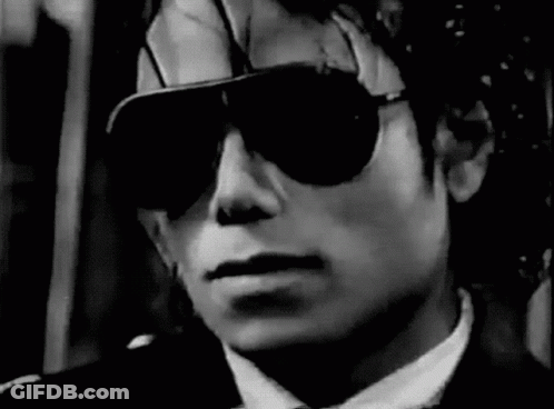 Man In Suit Wearing Sunglasses GIF