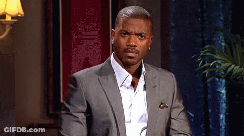Man In Suit White Shirt Looking At Camera GIF