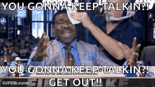 Man In Suit Wiped With Towel By Another Man GIF