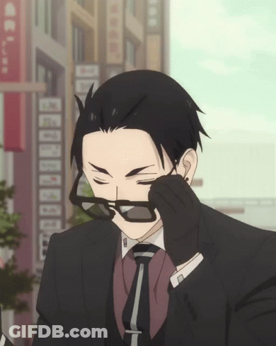 Man In Suit Wiping Glasses GIF
