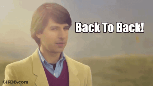 Man In Suit With Back To Back Sign GIF