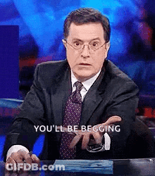Man In Suit With Bald Eagle In Green Tie GIF
