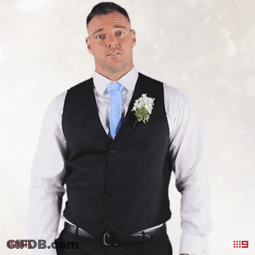 Man In Suit With Blue Tie And Flower GIF