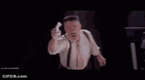 Man In Suit With Box Saying He's Back GIF