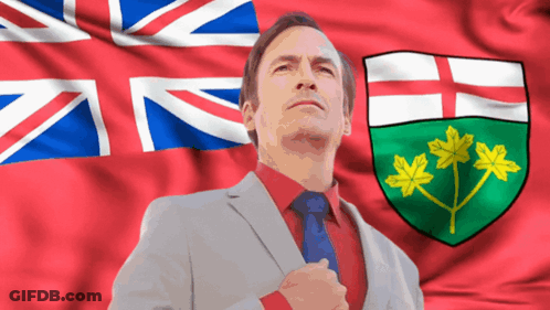 Man In Suit With British Flag GIF