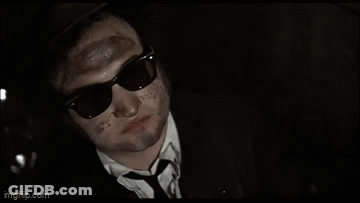 Man In Suit With Dirty Face GIF