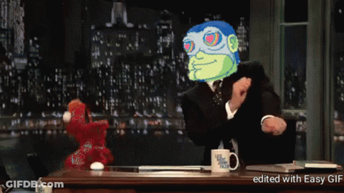 Man In Suit With Elmo And Late Night Talk Show Mug GIF