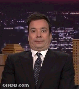 Man In Suit With Eyes Closed GIF