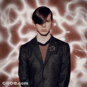 Man In Suit With Flower Lapel GIF