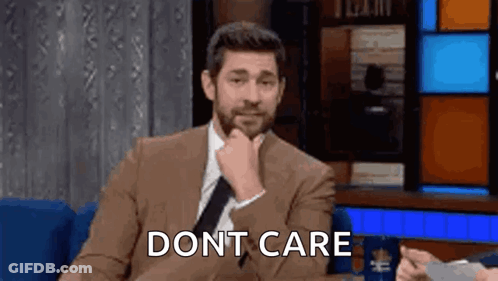 Man In Suit With Hand On Chin Saying Dont Care GIF