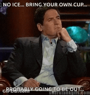 Man In Suit With Hand On Chin Shark Tank Meme GIF