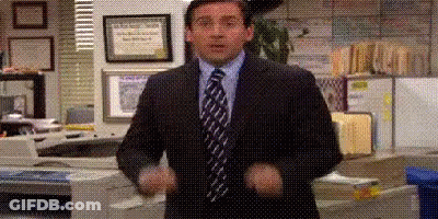 Man In Suit With Hands In Air GIF