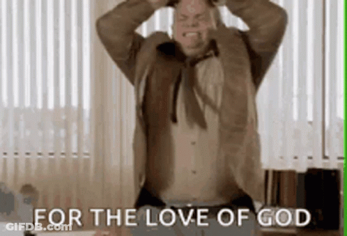Man In Suit With Hands On Head GIF