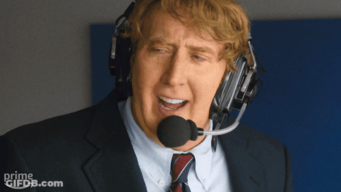 Man In Suit With Headset And Amazon Prime Logo GIF