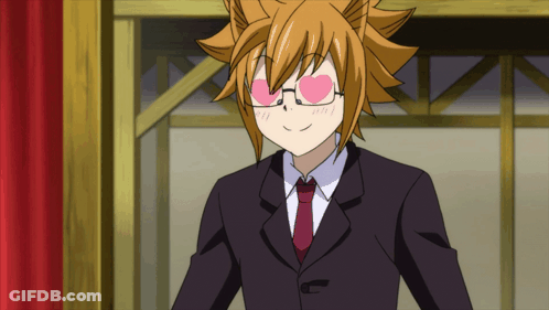 Man In Suit With Heart Shaped Eye GIF