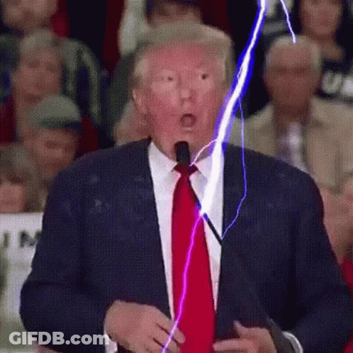 Man In Suit With Lightning Coming Out Of Mouth GIF