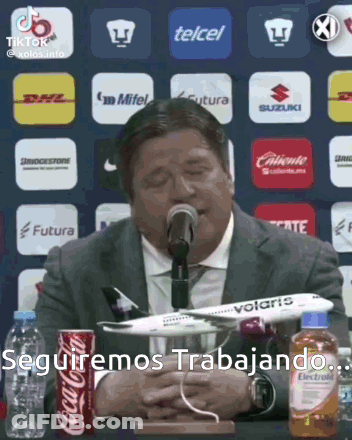 Man In Suit With Microphone Airplane And Coke GIF