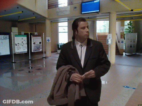 Man In Suit With No Smoking Sign GIF