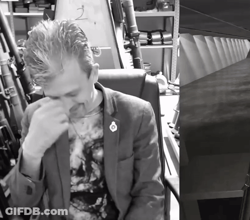 Man In Suit With Number 2 GIF