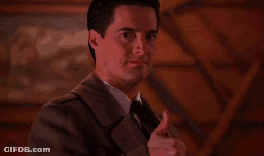 Man In Suit With Okay Hand Sign GIF
