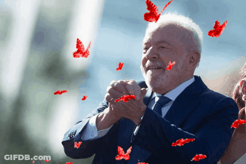 Man In Suit With Red Butterflies GIF