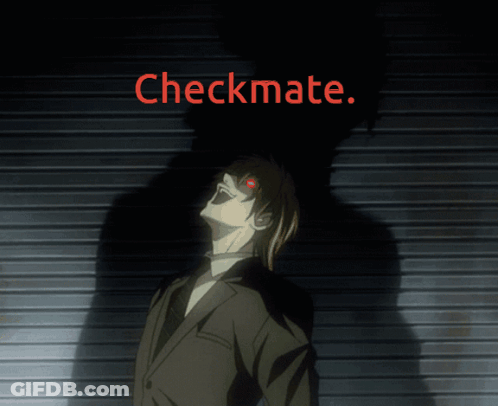 Man In Suit With Red Eyes Checkmate Sign GIF