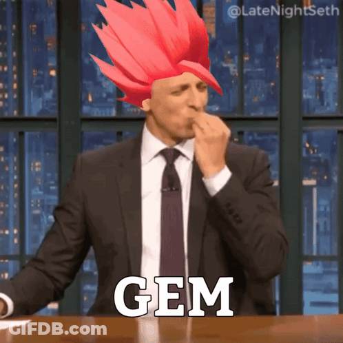 Man In Suit With Red Hair And Gem GIF