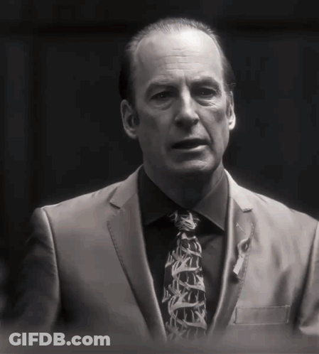 Man In Suit With Ribbon GIF
