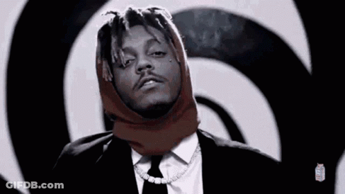 Man In Suit With Scarf On Head GIF