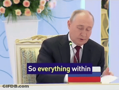 Man In Suit With Sign So Everything Within GIF
