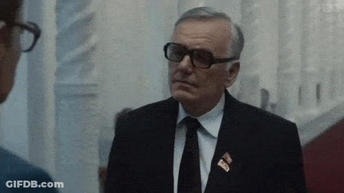 Man In Suit With Soviet Union Pin GIF