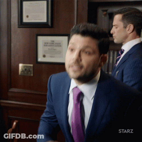 Man In Suit With Starz Logo GIF