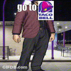 Man In Suit With Taco Bell Logo On Face GIF