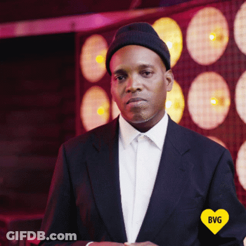 Man In Suit With Yellow Heart BVG GIF