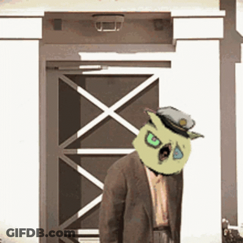 Man In Suit With Yellow Mask On Head GIF