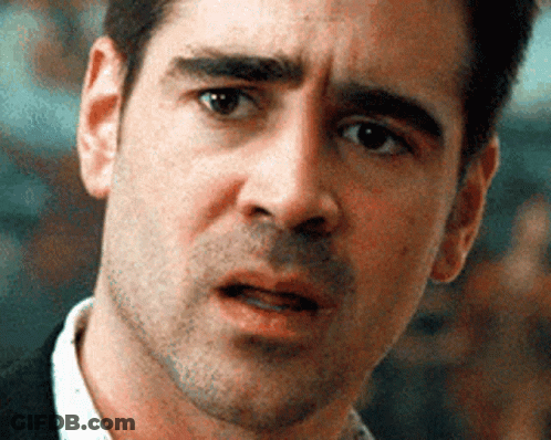 Man In Sunglasses And Bandana Flipping Off With Onlooker GIF