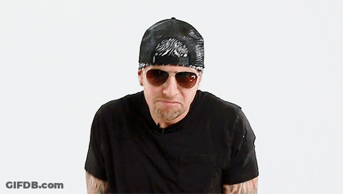 Man In Sunglasses And Bandana Making Funny Face GIF