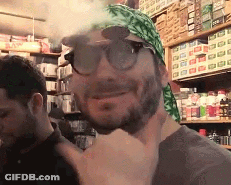 Man In Sunglasses And Bandana Smoking Cigarette GIF