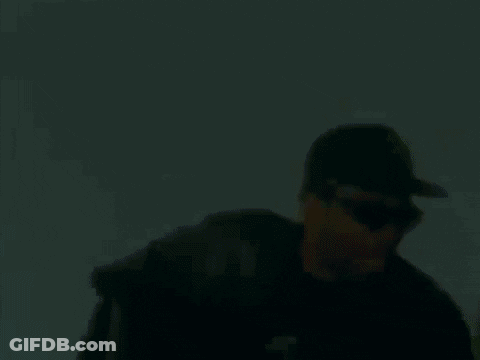 Man In Sunglasses And Baseball Cap Holding Beer Bottle GIF