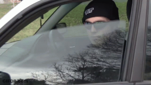 Man In Sunglasses And Beanie Saying Chicago GIF