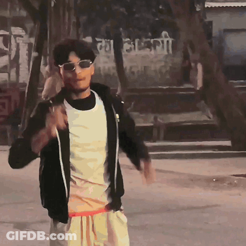 Man In Sunglasses And Black Jacket Before LG Sign GIF
