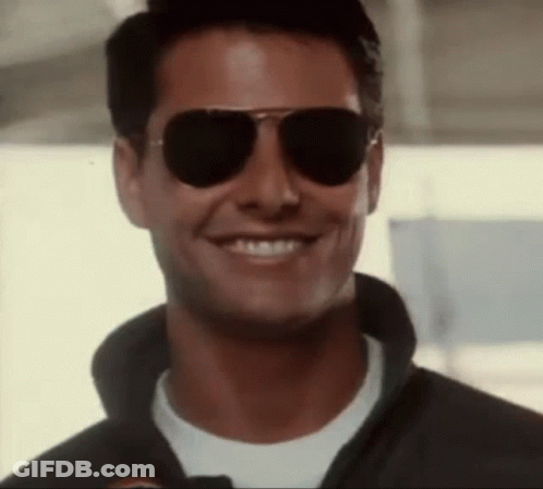 Man In Sunglasses And Black Jacket Smiling GIF