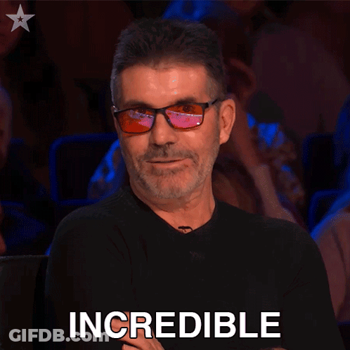 Man In Sunglasses And Black Shirt Saying Incredible GIF