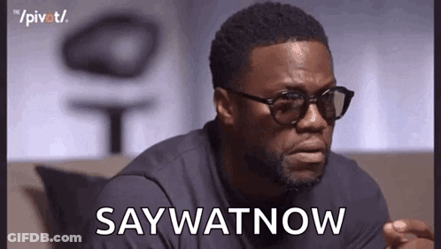 Man In Sunglasses And Black Shirt Saying Say Watnow GIF