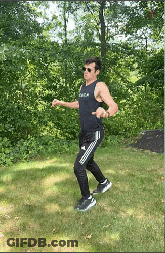 Man In Sunglasses And Black Tank Top Saying Boston GIF