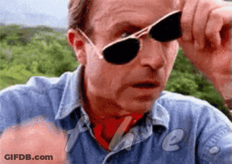 Man In Sunglasses And Blue Shirt Saying Fake GIF