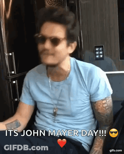 Man In Sunglasses And Blue Shirt Says It's John Mayer Day GIF