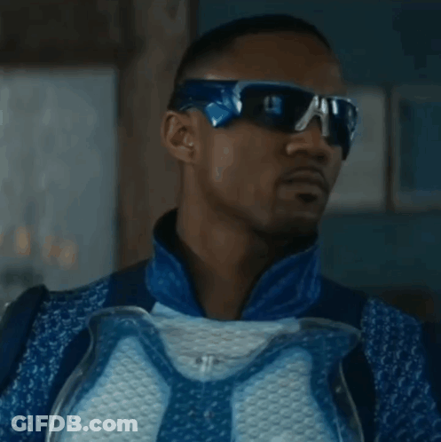 Man In Sunglasses And Blue White Costume GIF